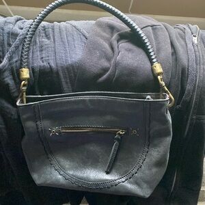 Black leather The Sak purse